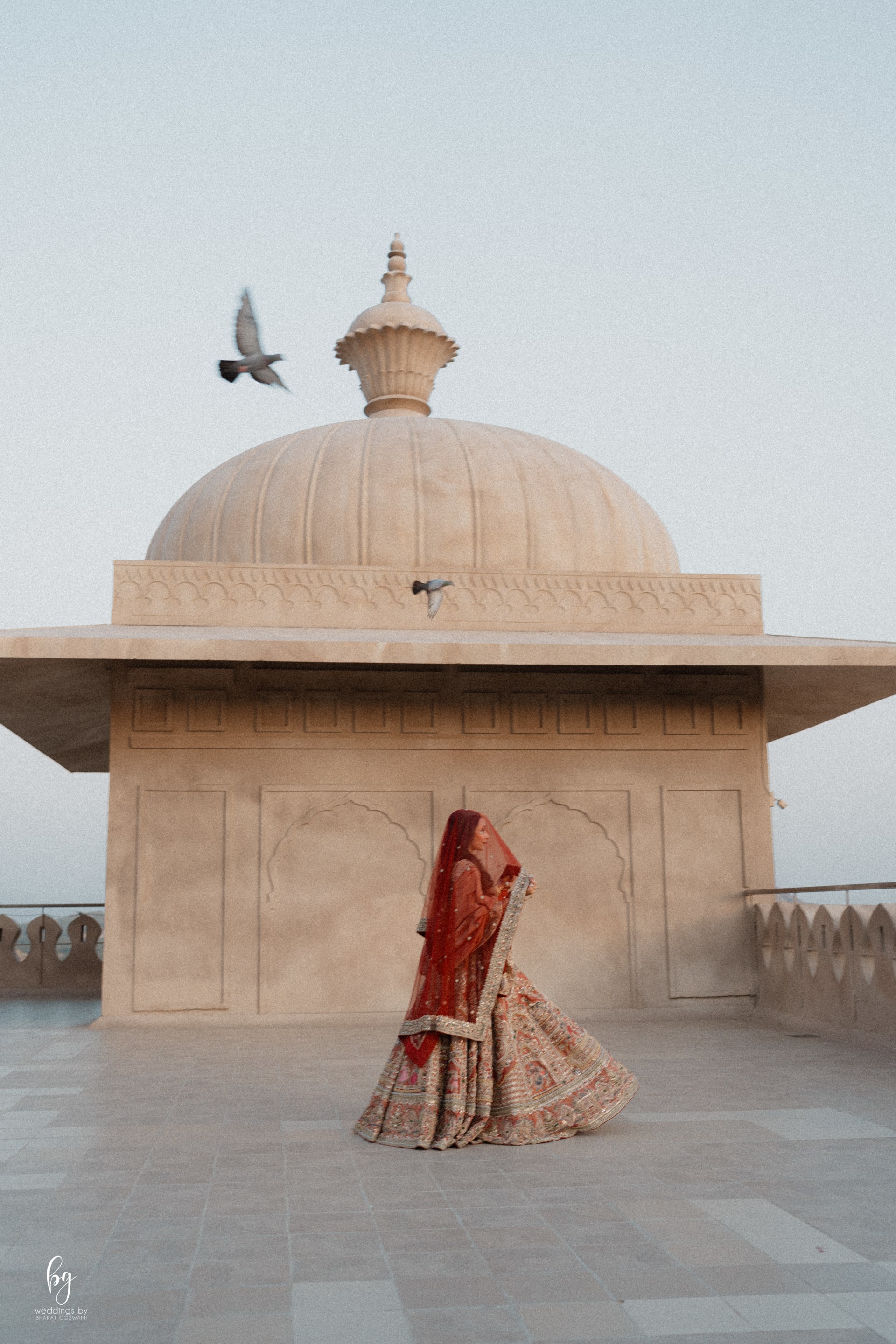 Bride in gold embroidered lehenga