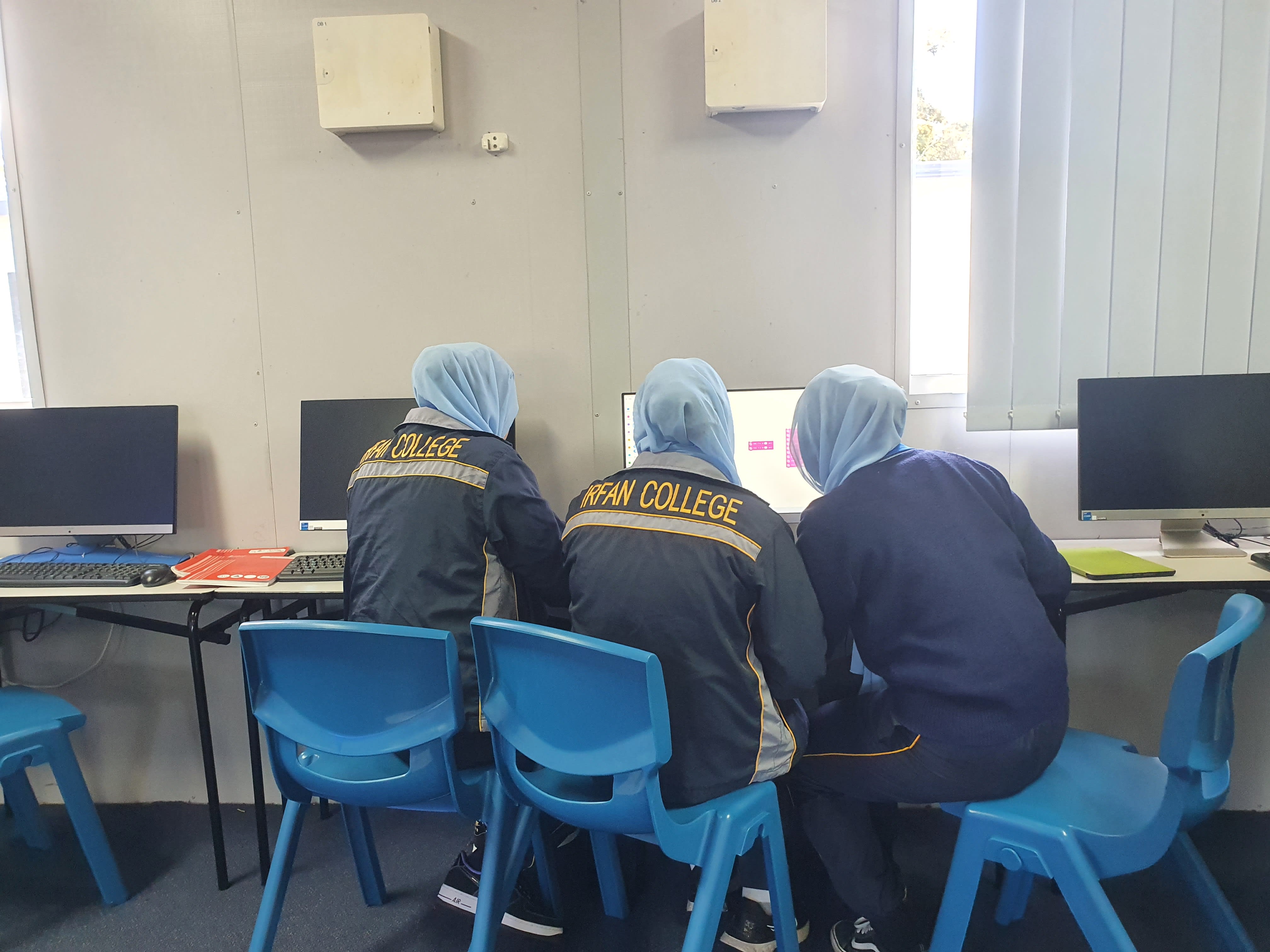 Irfan College students building with robotics kits