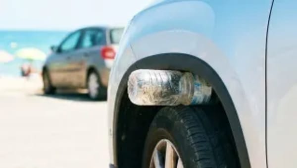 Robo de coche, el timo de la botella y la rueda, cómo evitarlo