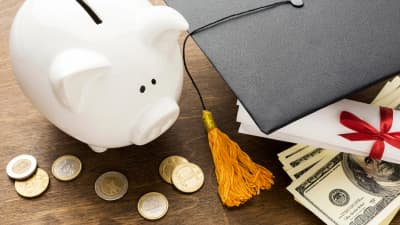 High-angle-piggy-bank-with-academic-cap-coins_2 (1)