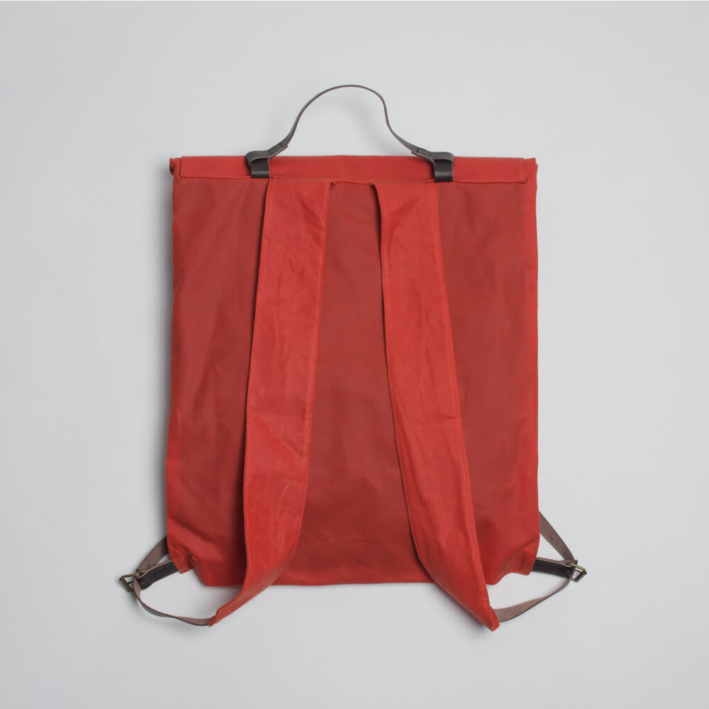 ORANGE PERFORM BACKPACK WITH BROWN LEATHER DETAILS