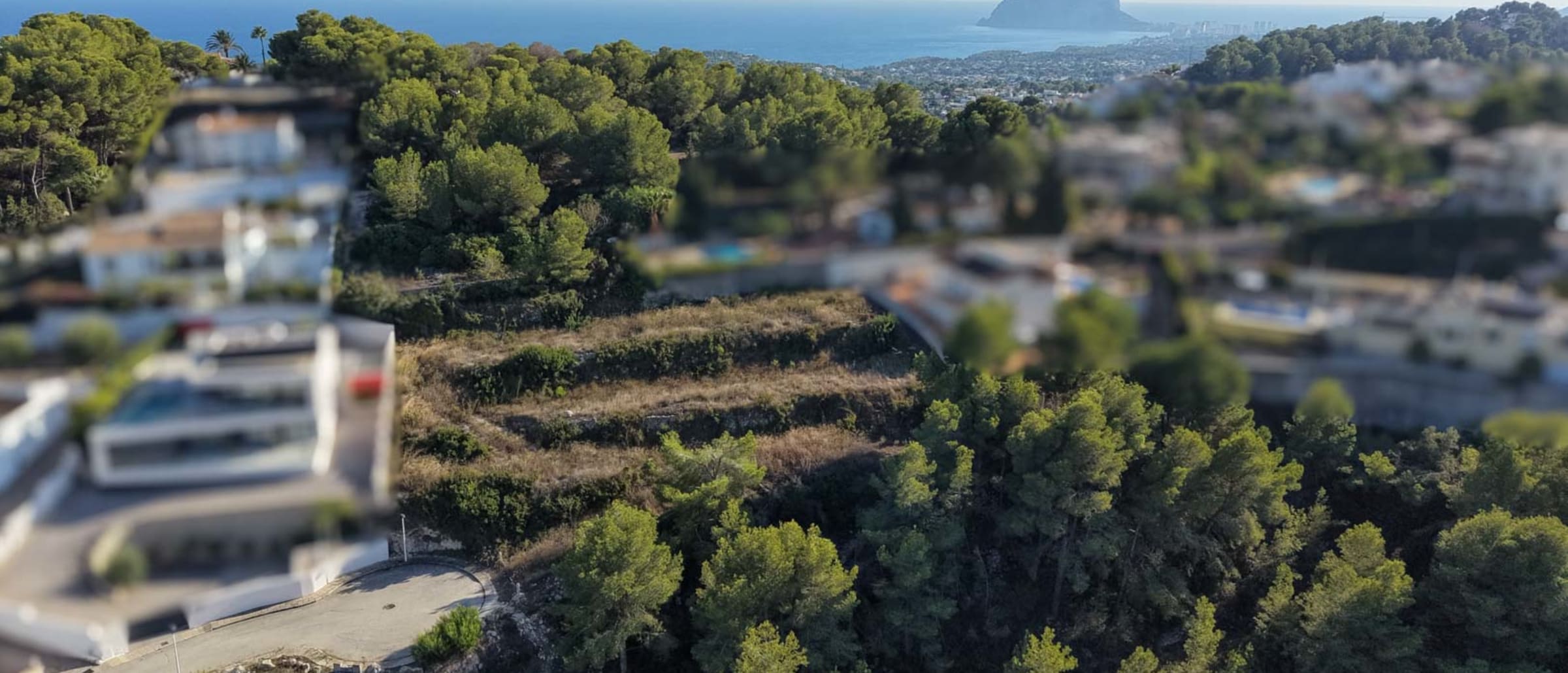 8303MOR Urban plot with open mountain views and partial glimpses of the sea, for sale in Moraira. - Image 1
