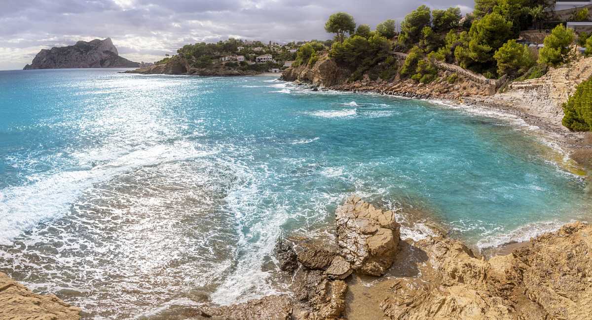 Cala els Pinets in Benissa with calm turquoise water
