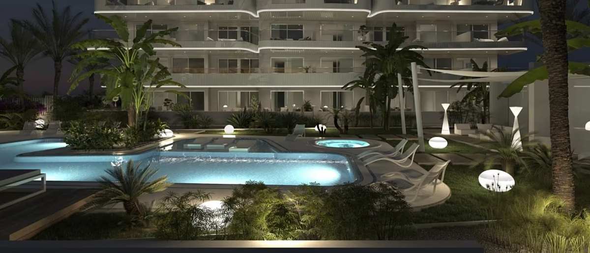 Landscaped communal area with swimming pool in a Jávea apartment complex