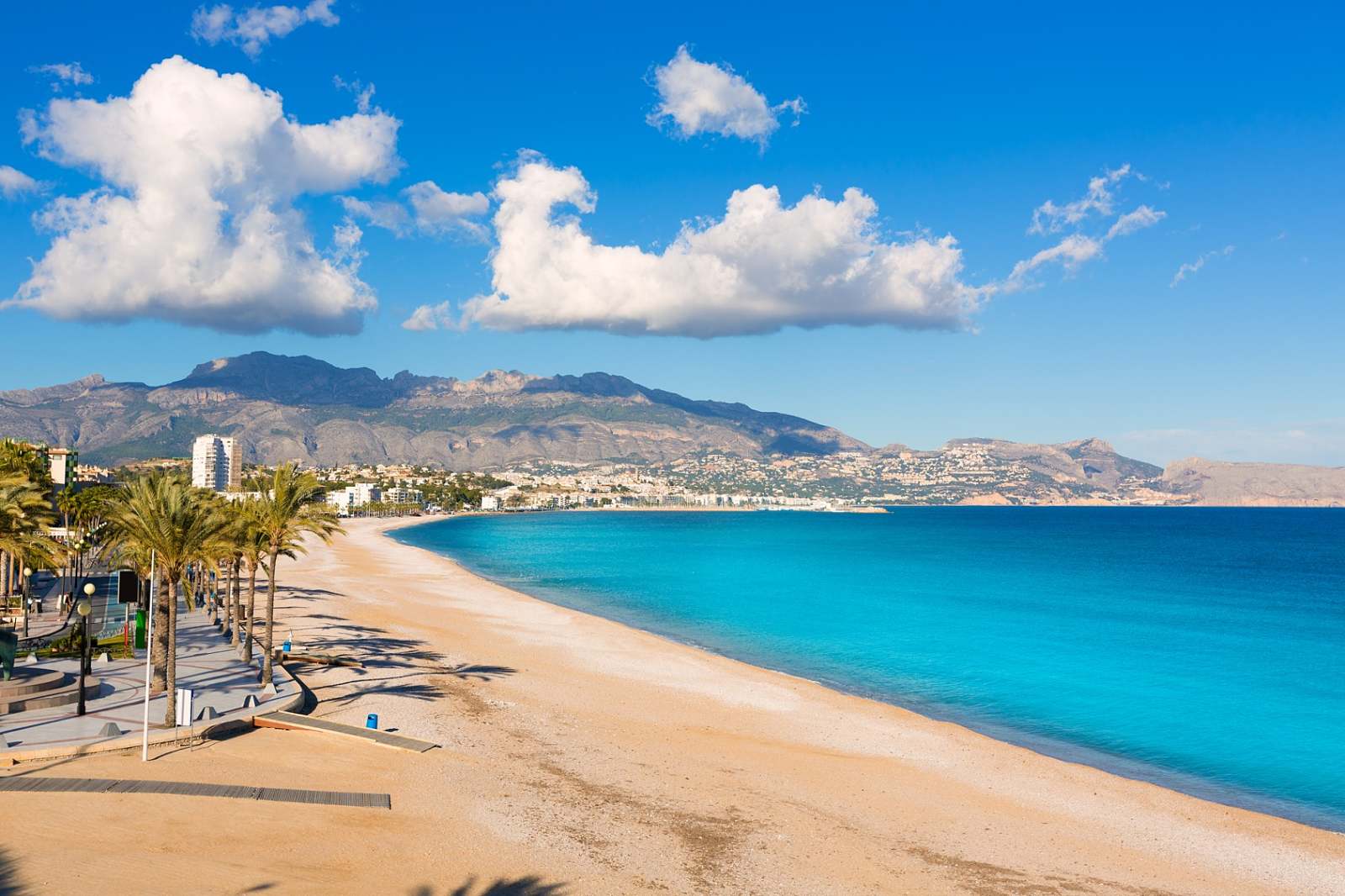 White pebble beach at Playa del Albir in Altea, Alicante with turquoise Mediterranean waters