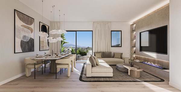 Åpen stue og spisestue med moderne pendellamper og havutsikt