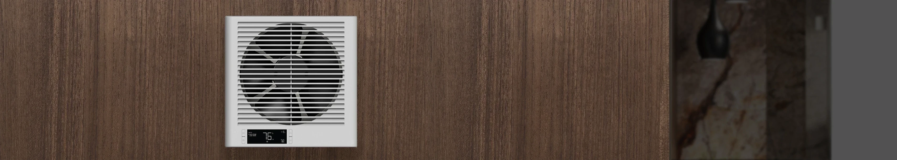 Close-up view of the Room to Room Fan with its built-in digital controller display, set against a modern wood paneled wall.