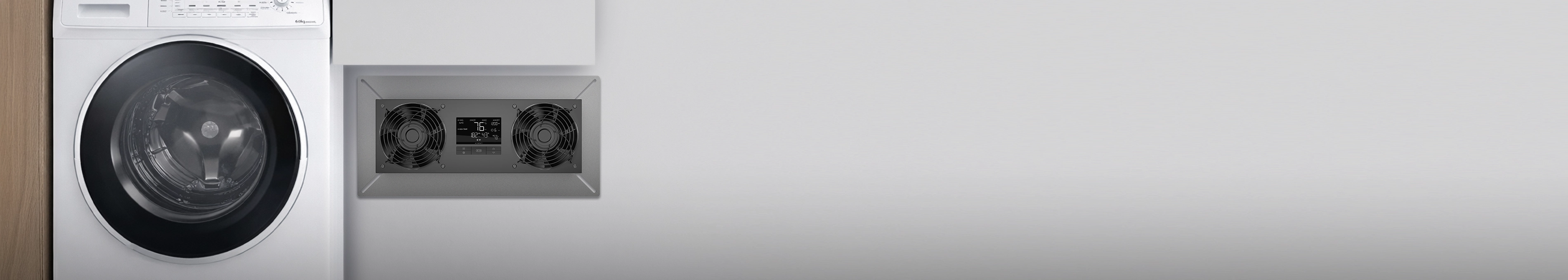 Airtitan series crawlspace fan mounted on a basement wall next to a laundry machine.