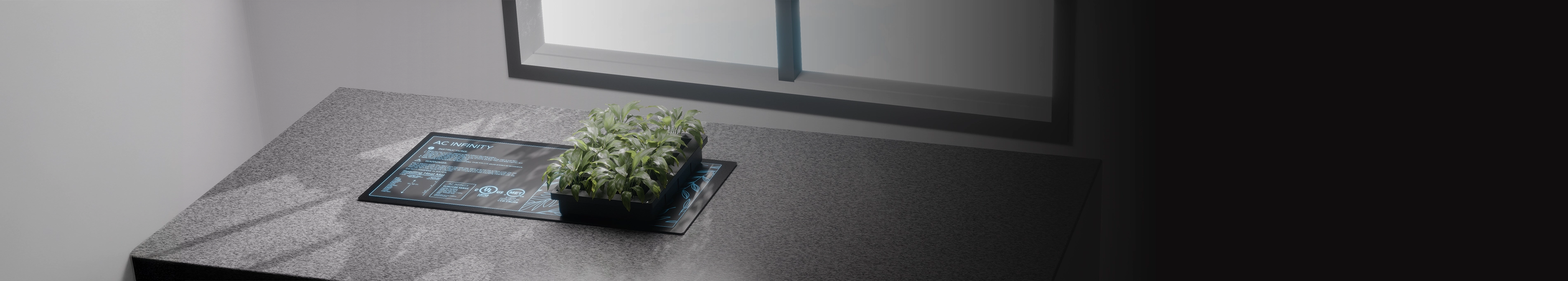 Suncore seedling heating mat with seedling trays and healthy green sprouts on top.