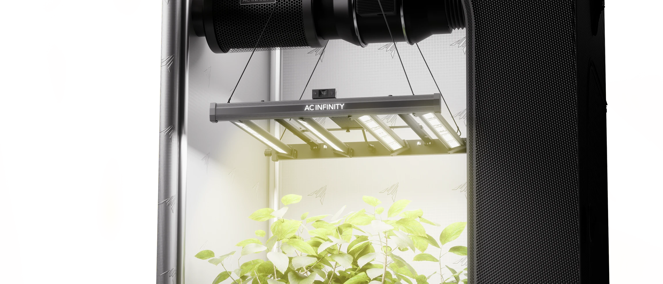 AC Infinity Ionprime LED grow light illuminating indoor plants inside a climate-controlled grow tent.