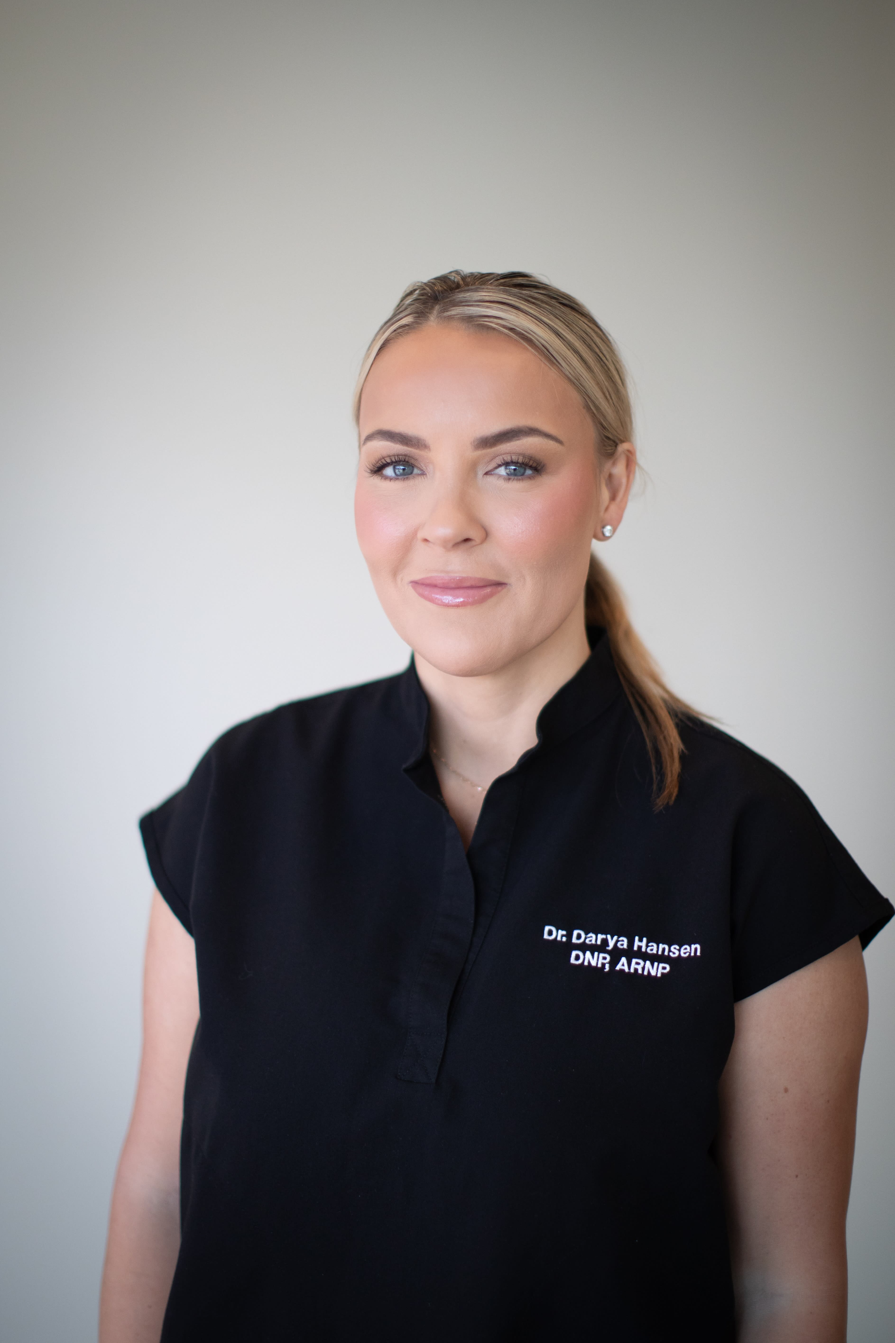 Dr. Darya Hansen, DNP, ARNP — founder of Aesthetic Collective