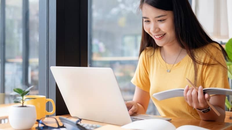 online student doing school search for affordable online colleges