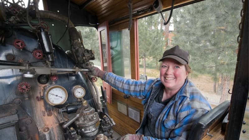 Female mechanic smiling