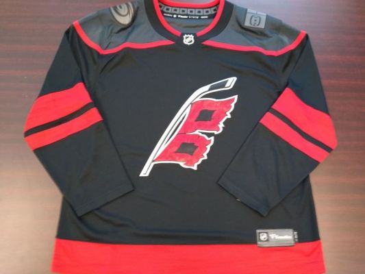 Carolina hurricanes auction clearance
