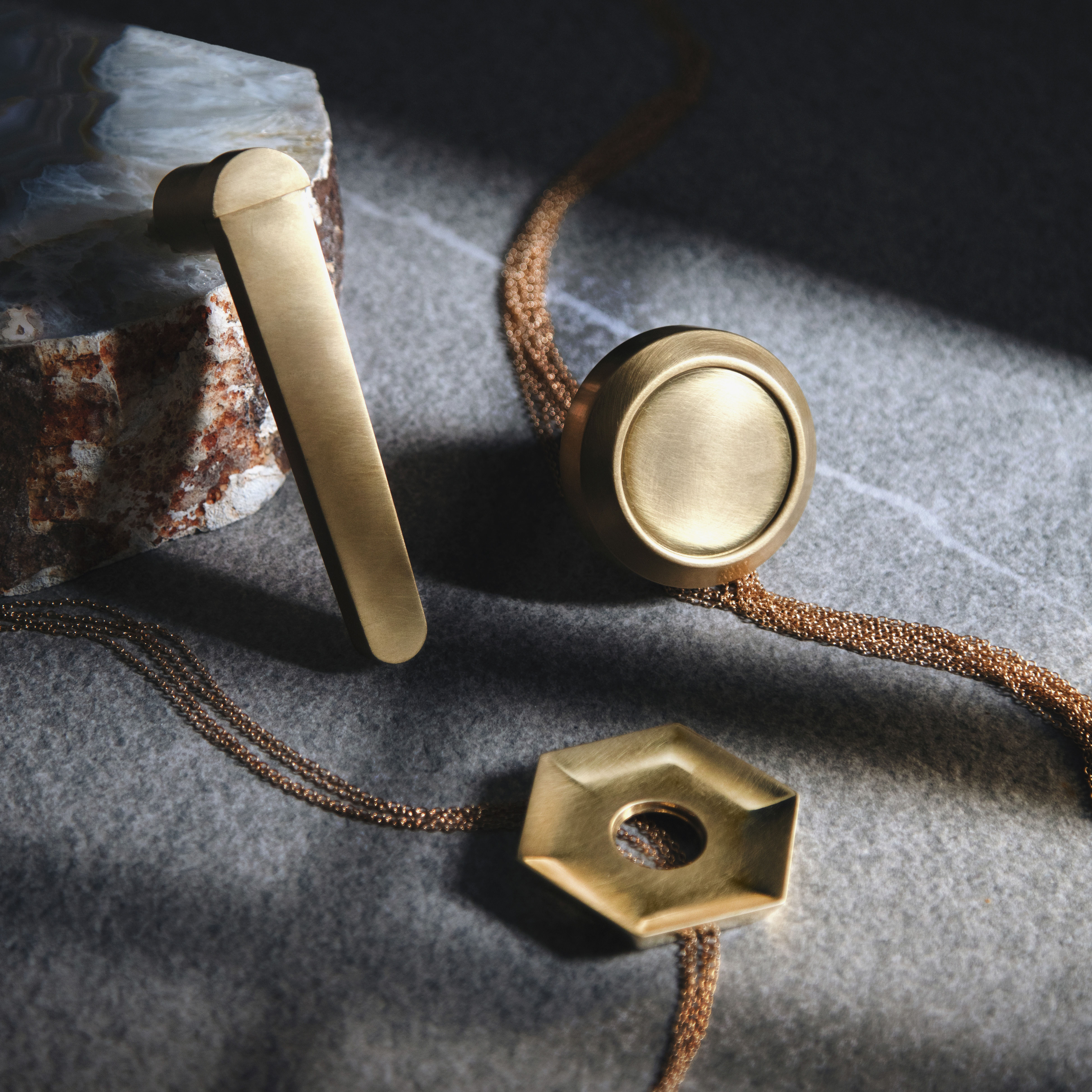 Thom Filicia for Accurate Collection of Hardware stylized photo of mixed collection styles finished in BB Burnished Brass