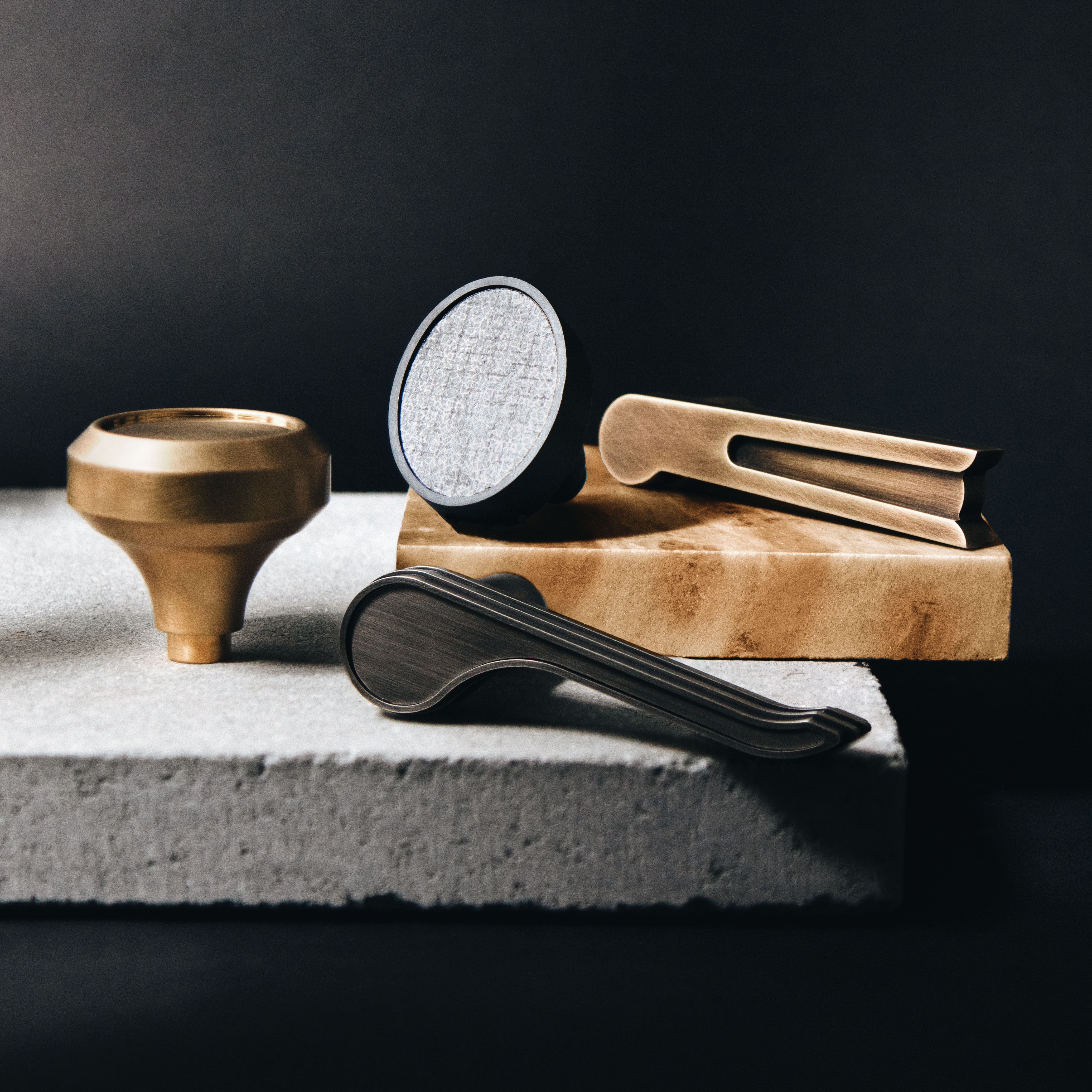 Thom Filicia for Accurate Collection of Hardware stylized photo of mixed collection styles in a variety of finishes