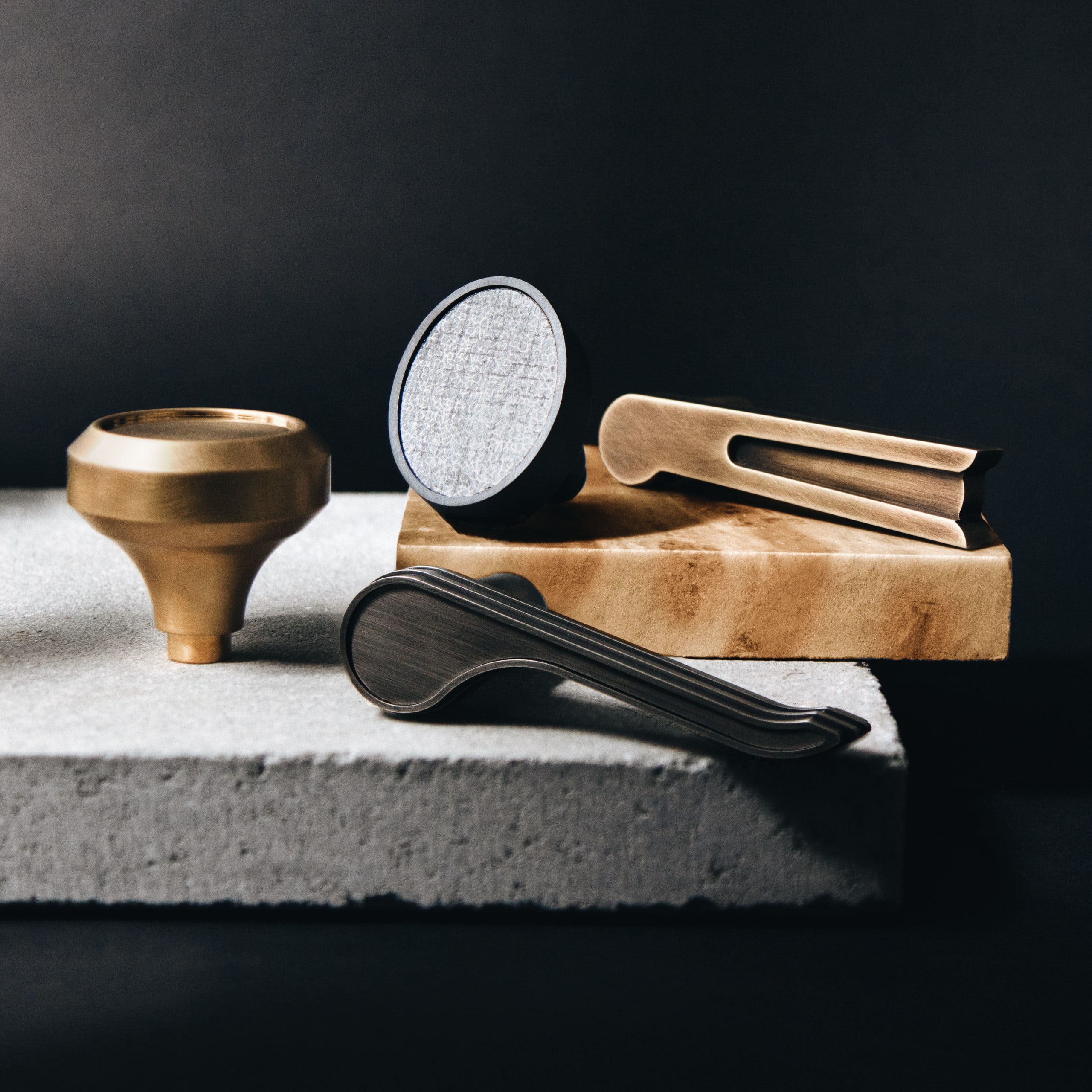 Thom Filicia for Accurate Collection of Hardware stylized photo of mixed collection styles in a variety of finishes