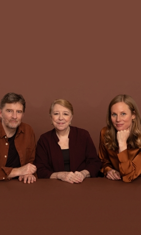 The three founders of the Torn Project sitting together, and looking directly at the camera