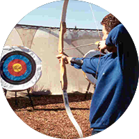 Man Aiming at an Archery Target