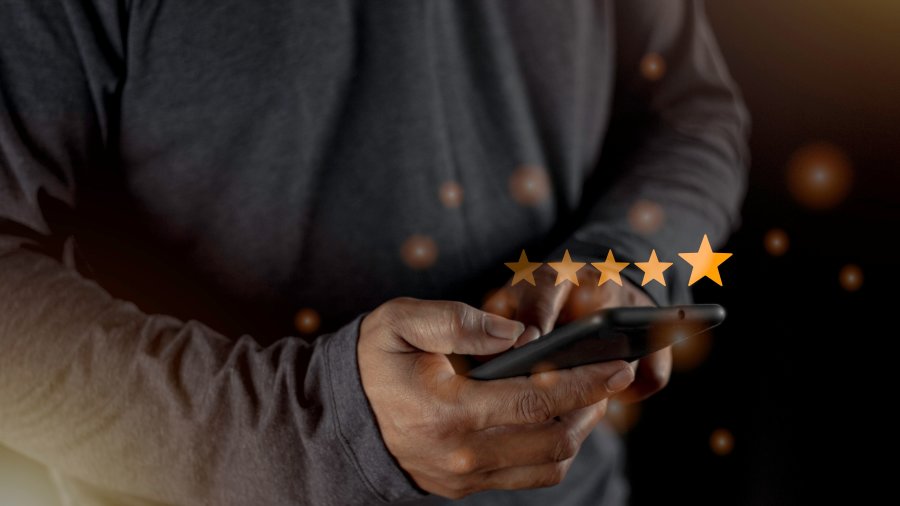 satisfaction-close-up-customer-man-hand-pressing-screen-with-five-star-rating-feedback-icon-press-level-excellent-rank-giving-best-score-point-review-service-concept
