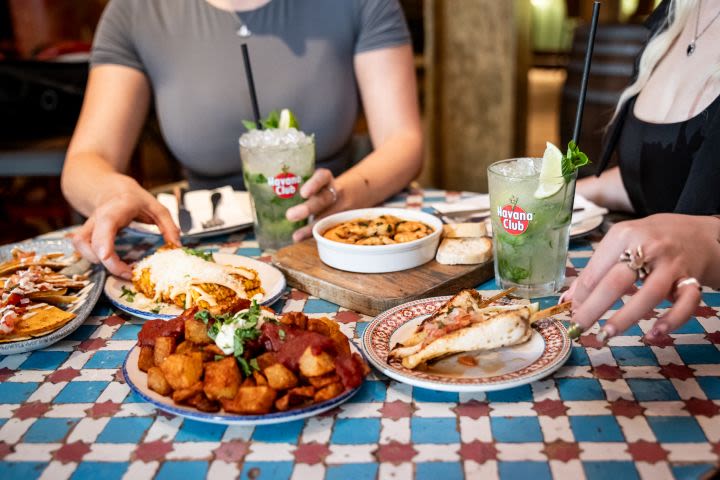 Bottomless Mojitos or Cruz Campo with 5 Plates