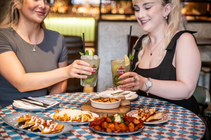 Bottomless Mojitos or Cruz Campo with 5 Plates