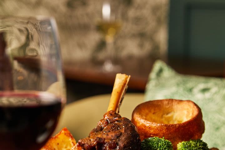Traditional Sunday Roast with a Glass of Wine for Two