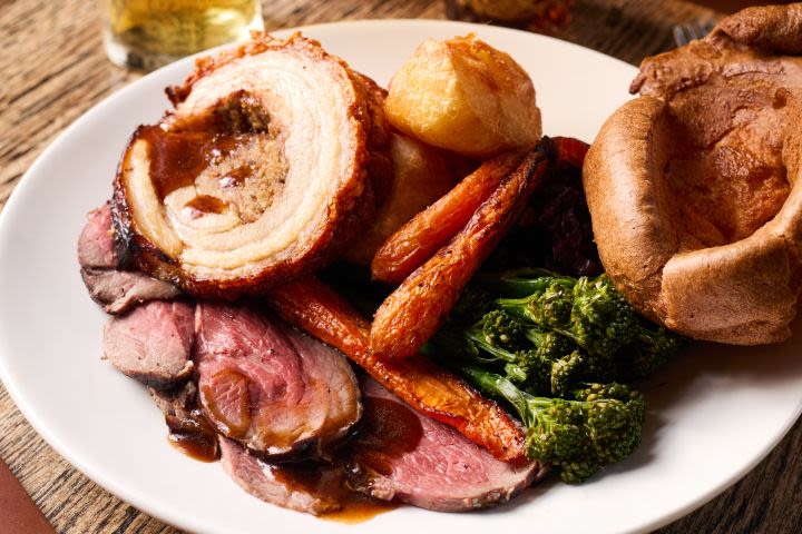 Traditional Sunday Roast with a Glass of Wine for Two