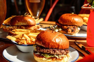 Gourmet Burger and Beer for Two at Revolution Bars