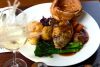 Traditional Sunday Roast with a Glass of Wine for Two