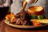 Traditional Sunday Roast with a Glass of Wine for Two
