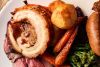 Traditional Sunday Roast with a Glass of Wine for Two