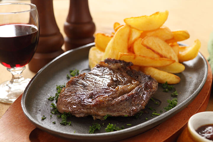 Sizzler Steak for Two with a Bottle of Wine
