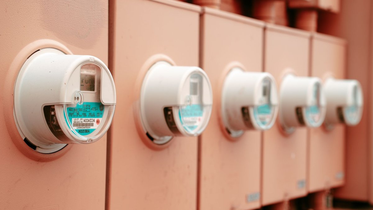 Lithium mineralization extended in Quebec project Close-up view of a row of industrial electricity meters for power monitoring and technology.