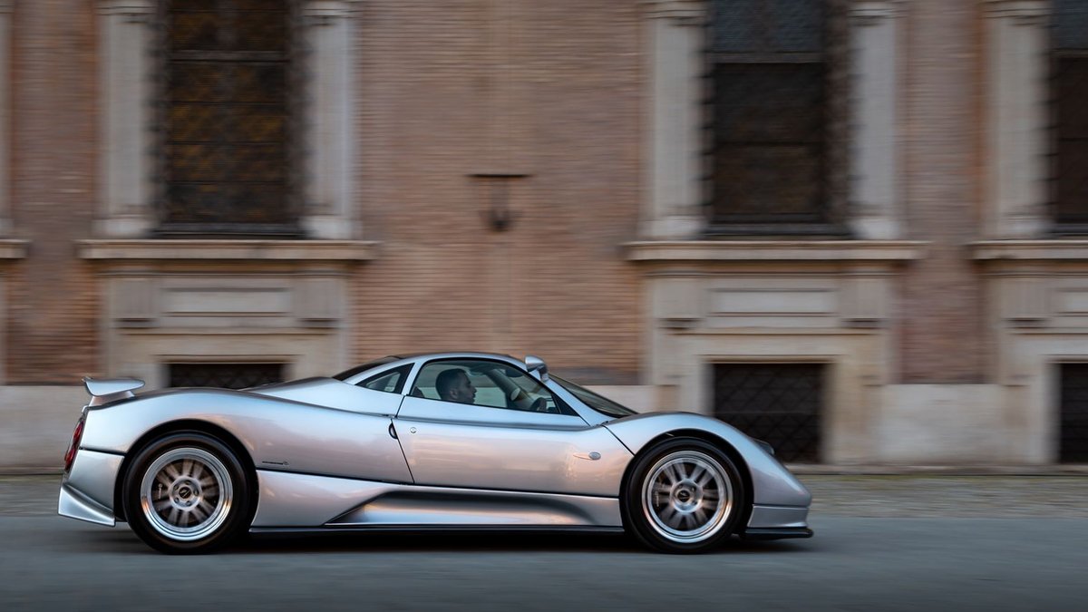 Some Florida and South Carolina markets outperform Sleek silver supercar speeding through a historic urban environment, showcasing luxury and performance.