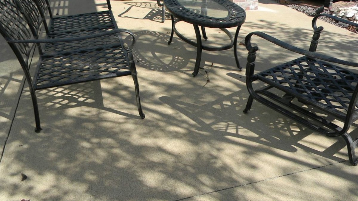 Patio transformed with painted rug design - painted rug
