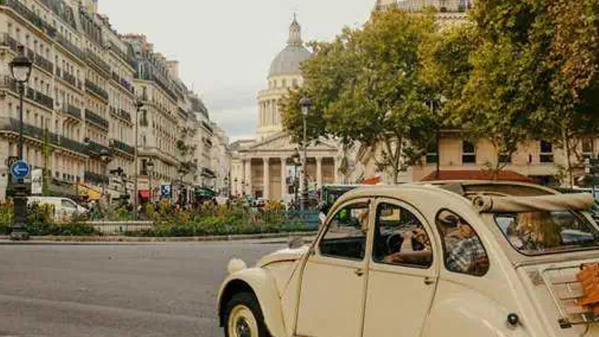France offers diverse holiday destinations Vintage Car in Front of the Pantheon in Paris (Céline on pexels).