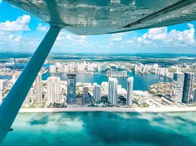 Miami beach private plane tour with drinks