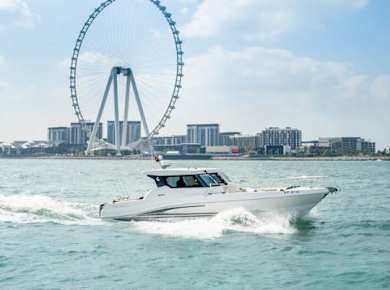 Private 36-feet yacht rental to glide in Dubai Marina