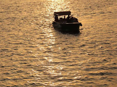 Sunset by boat in Terrasini with aperitif and swimming