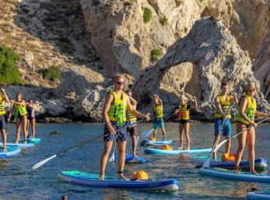 Small-group coastal SUP experience with sea caves and snorkelling