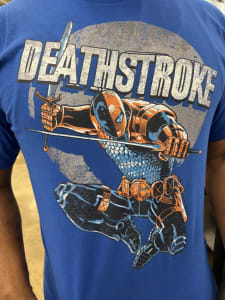 DeathStroke, a super hero with two swords