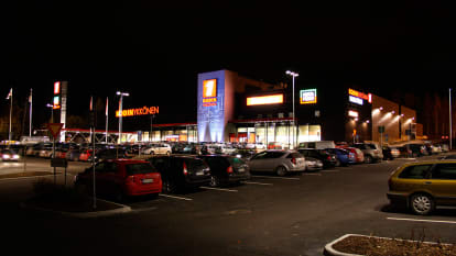The lit up Home Center Lielahti during the night.