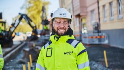 Picture of a smiling worker.