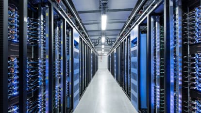A row of blue coloured servers inside the Facebook data centre in Luleå, Sweden.