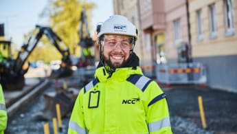 Picture of a smiling worker.