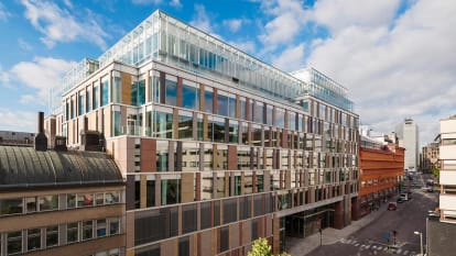 Mästerhuset in Stockholm, with a facade of mostly glass.