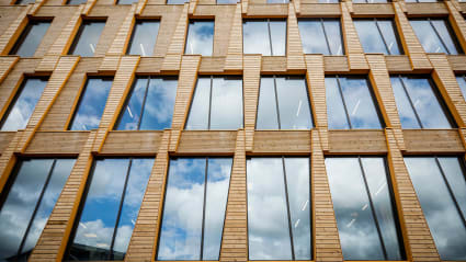 A picture of the facade of Valle Wood, made of wood.