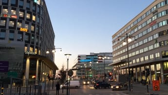 Picture of a thoroughfare at Torsplan in Stockholm. Several new developments are visible at the sides and in the background.