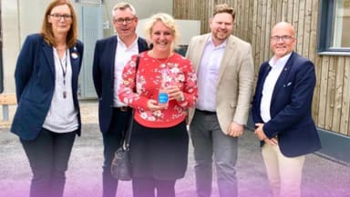 Medverkande i Stadspodden poserar för ett foto.